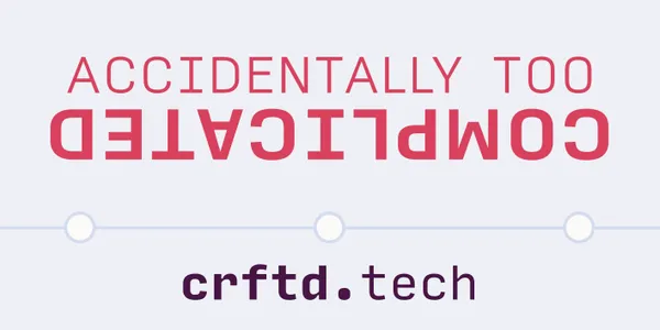 A rectangular sticker with crftd.tech at the bottom and the top reads "Accidentally too complicated" in bold pink letters on a light lilac background